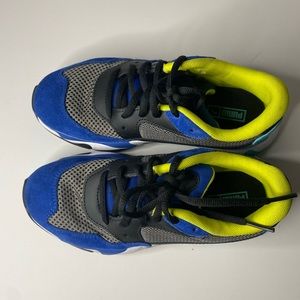 Boy’s Puma sneakers black, blue, and neon green color shoe size 3.5
